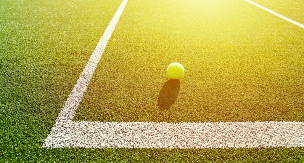 Tennis ball on a court