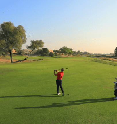 two golfers at Arabian Ranches Golf Club