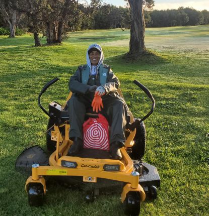 Pualani Daniels on a mower