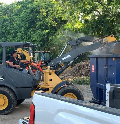 Claudia Talamantes working a tractor
