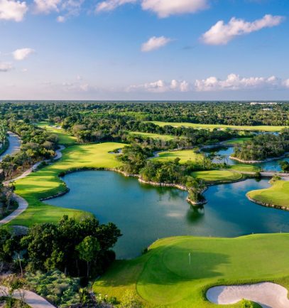 Arial view of PGA Riviera Maya Golf Course featuring fairways, greens, bunkers, and water features